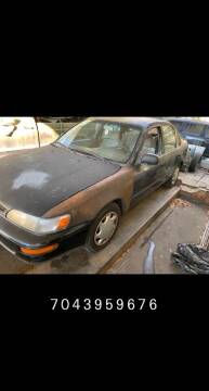 1997 Toyota Corolla for sale at Russ's Tire and Auto LLC in Charlotte NC