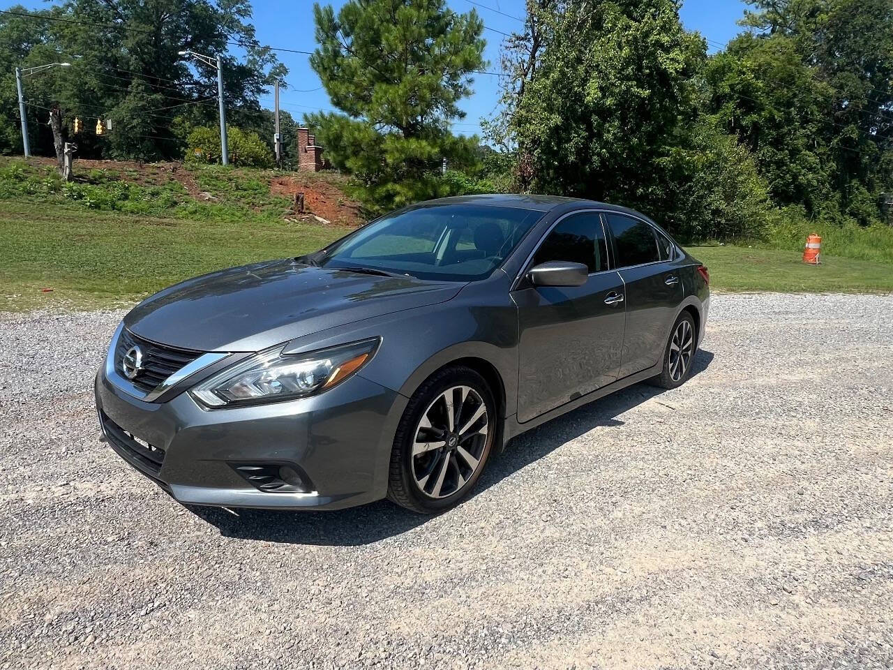 2016 Nissan Altima for sale at Guadalupe Auto Sales, LLC. in Jemison, AL