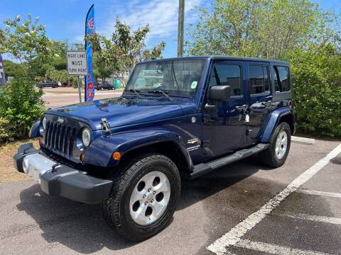 2013 Jeep Wrangler Unlimited for sale at Bay City Autosales in Tampa FL