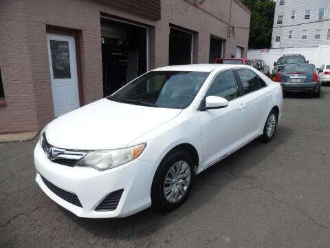 2012 Toyota Camry for sale at Village Motors in New Britain CT