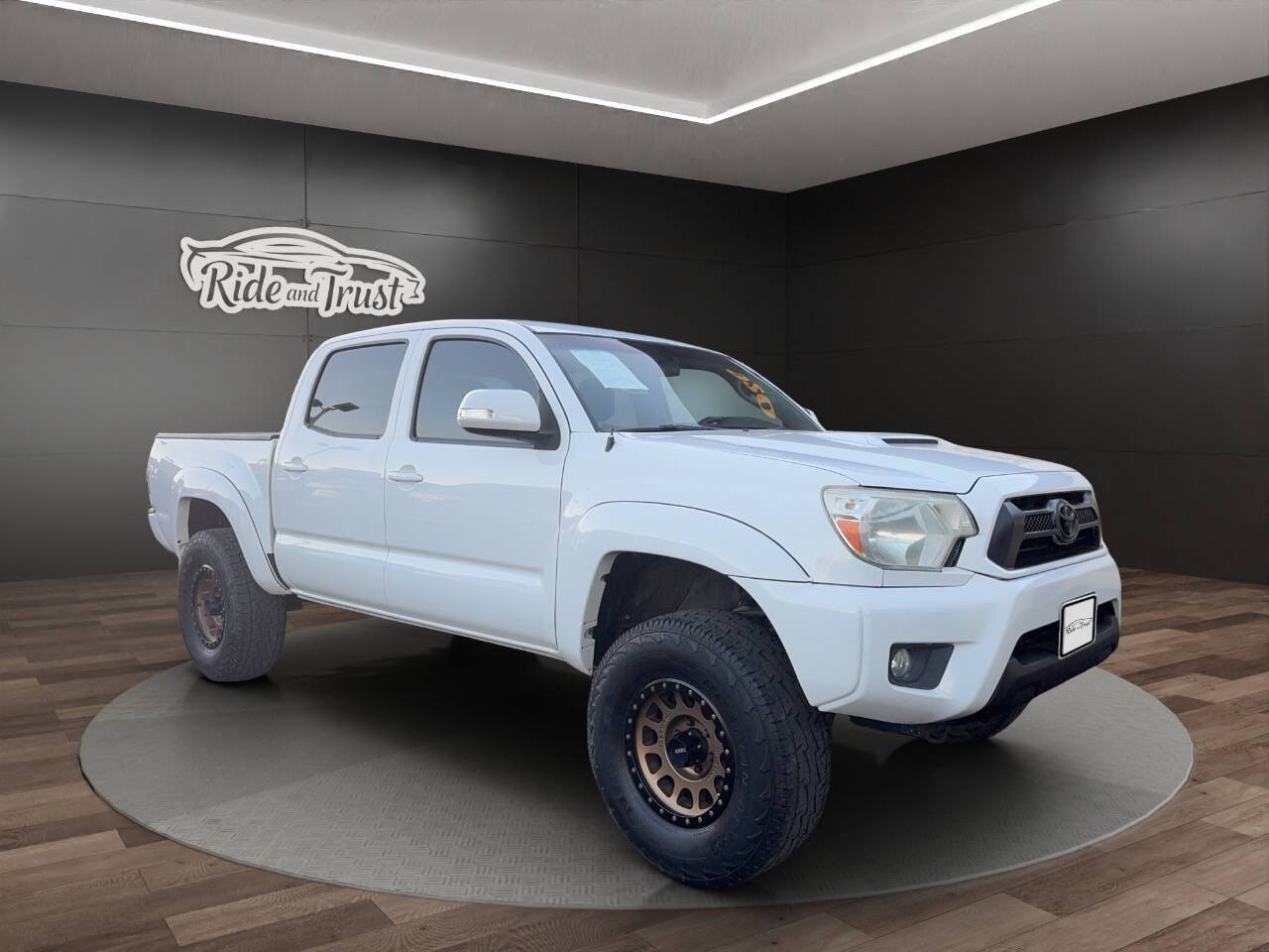 2014 Toyota Tacoma for sale at Ride And Trust in El Cajon, CA