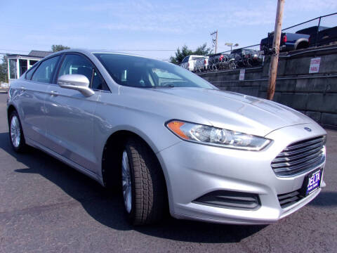 2013 Ford Fusion Hybrid for sale at Delta Auto Sales in Milwaukie OR