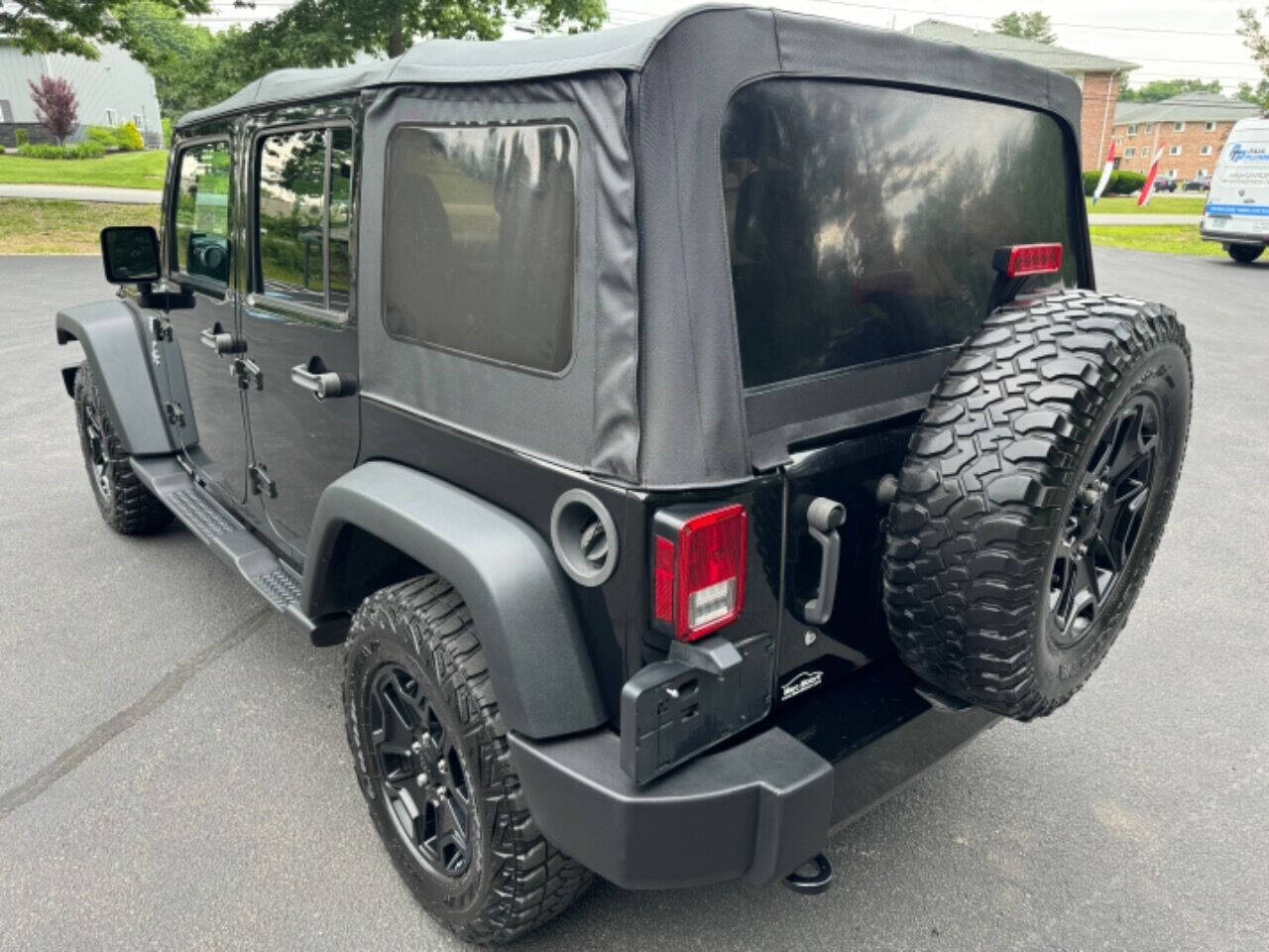 2016 Jeep Wrangler Unlimited for sale at BRW Motorsports LLC in Derry, NH