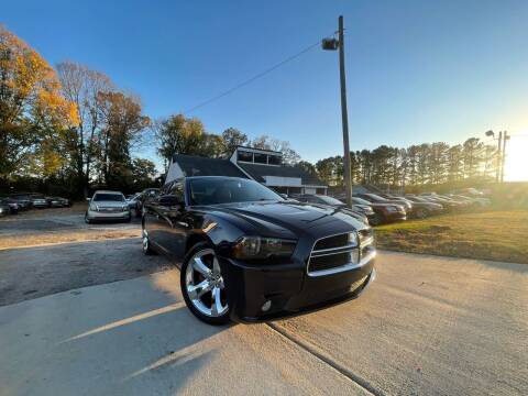 2012 Dodge Charger for sale at Alpha Car Land LLC in Snellville GA