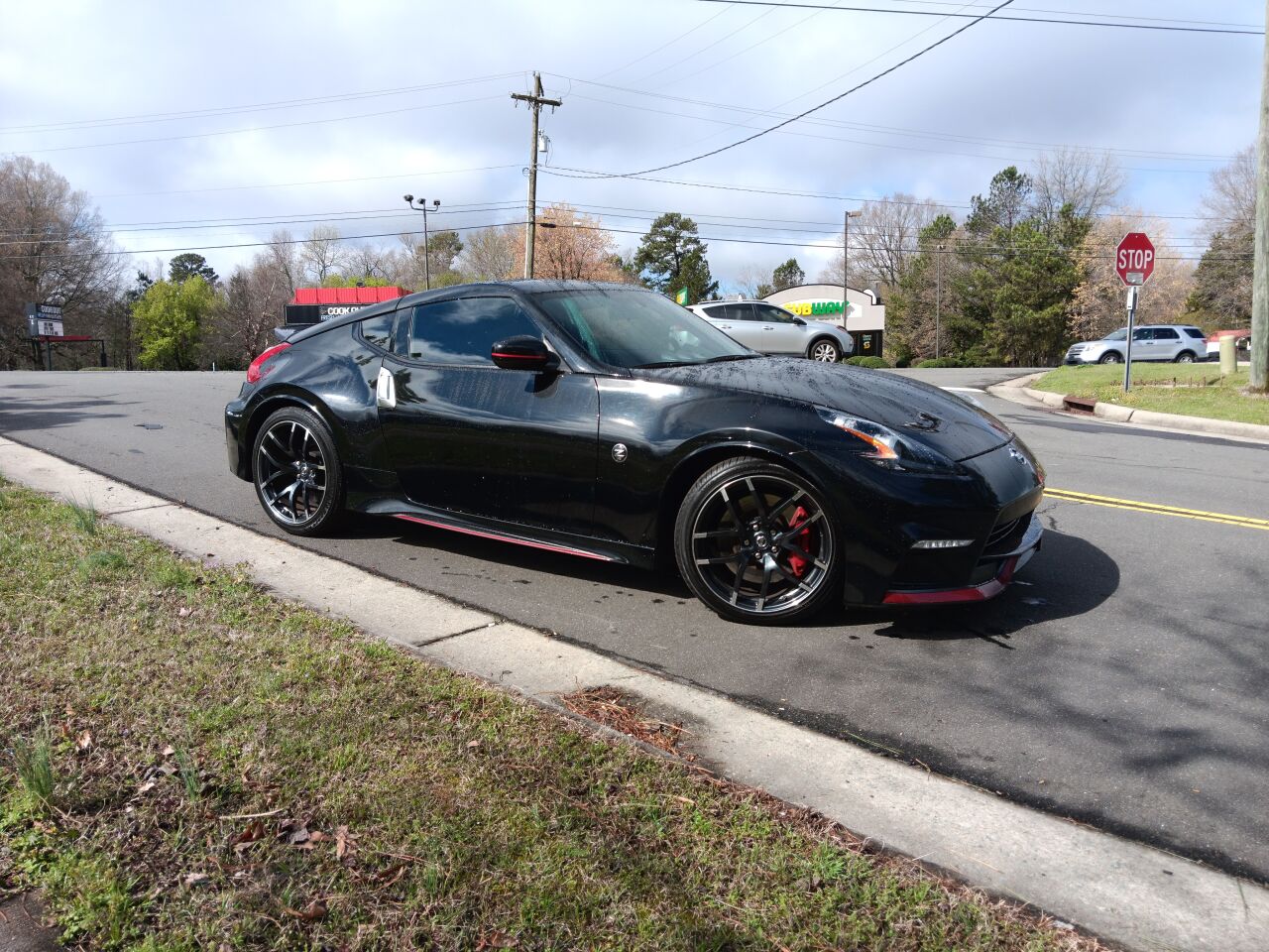 Preowned 2015 NISSAN 370Z NISMO 2dr Coupe 6M for sale by The Auto Finders Car Dealership of Durham in Durham, NC