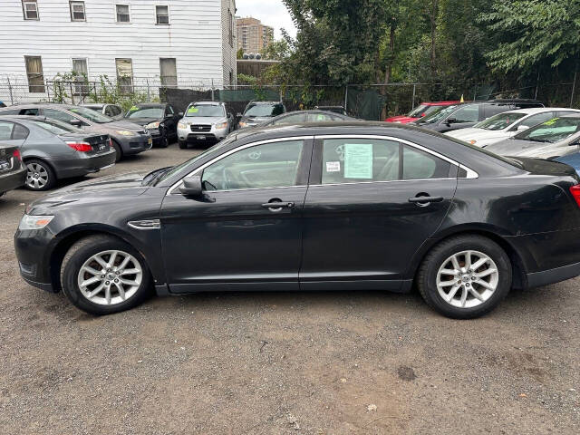 2013 Ford Taurus for sale at 77 Auto Mall in Newark, NJ