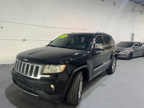 2012 Jeep Grand Cherokee for sale at Lamberti Auto Collection in Plantation FL
