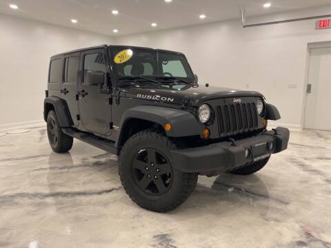 2012 Jeep Wrangler Unlimited for sale at Auto House of Bloomington in Bloomington IL