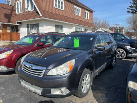 2011 Subaru Outback for sale at Holiday Auto Sales in Grand Rapids MI