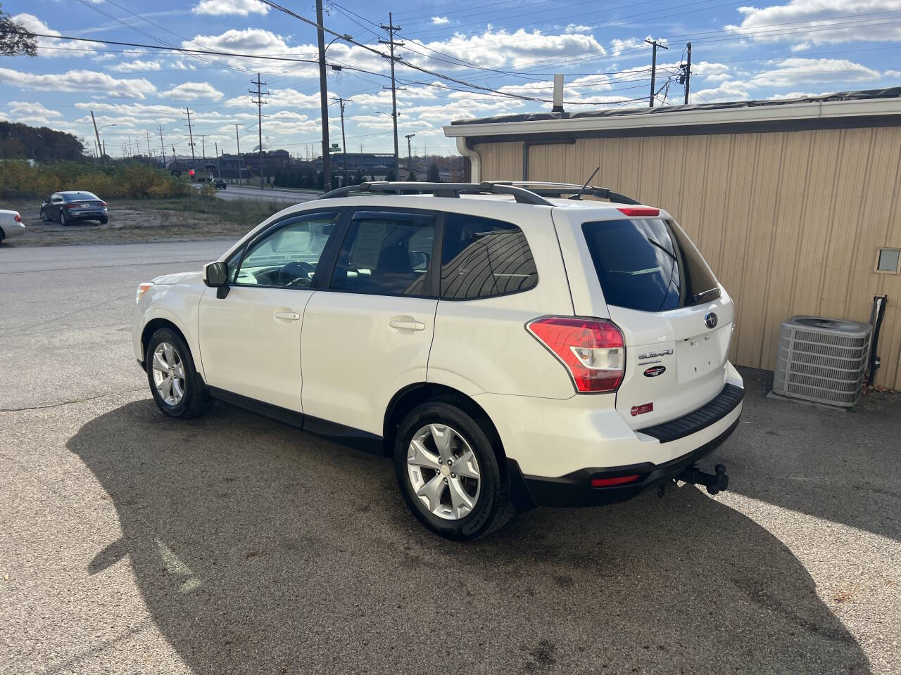 2014 Subaru Forester for sale at BNM AUTO GROUP in GIRARD, OH