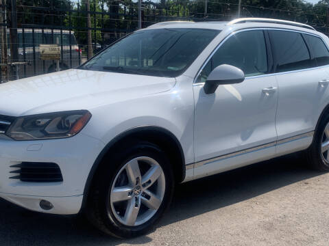 2012 Volkswagen Touareg for sale at FAIR DEAL AUTO SALES INC in Houston TX