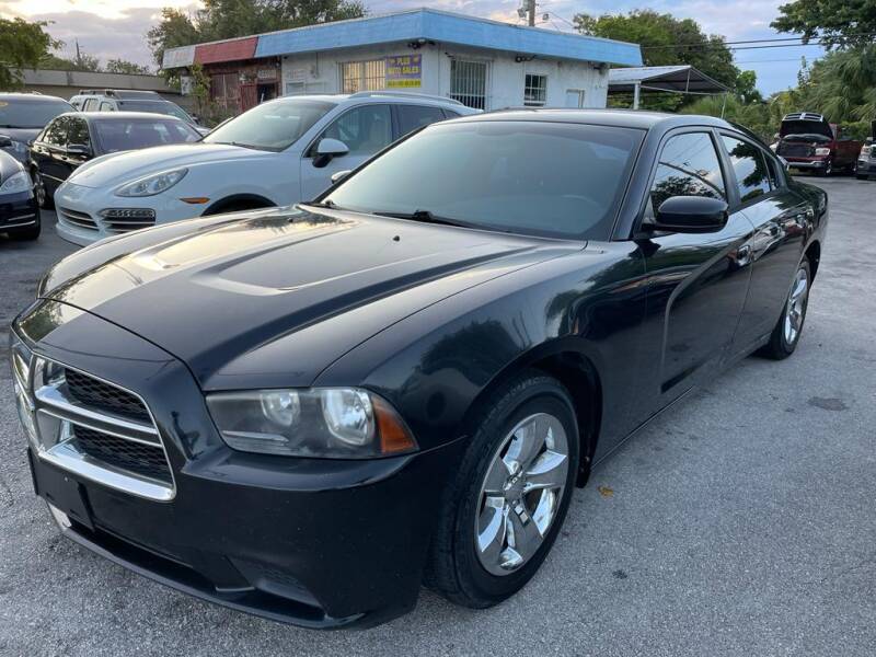2014 Dodge Charger for sale at Plus Auto Sales in West Park FL