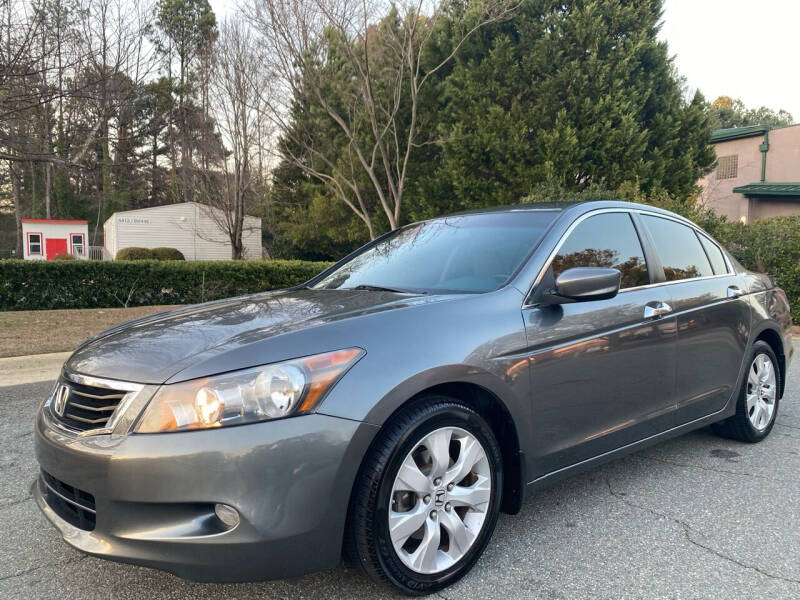2010 Honda Accord for sale at Triangle Motors Inc in Raleigh NC