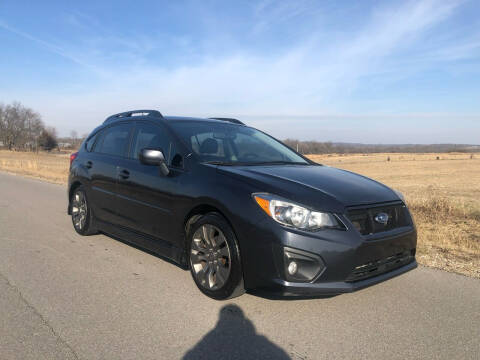 2014 Subaru Impreza for sale at Hitt & Mis Auto in Cape Girardeau MO