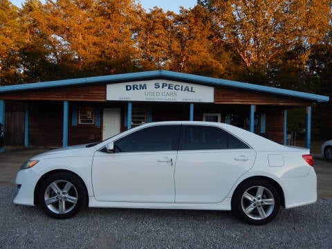 2012 Toyota Camry for sale at DRM Special Used Cars in Starkville MS