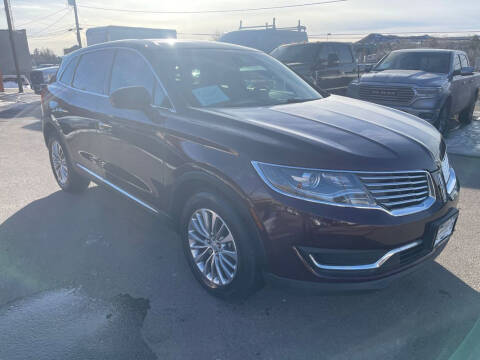 2017 Lincoln MKX for sale at BERKENKOTTER MOTORS in Brighton CO