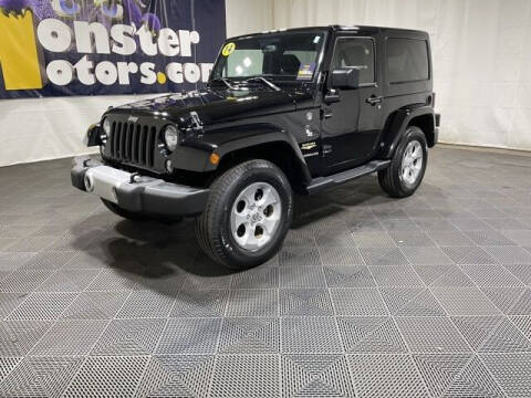 2014 Jeep Wrangler for sale at Monster Motors in Michigan Center MI