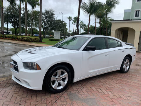2013 Dodge Charger for sale at CarMart of Broward in Lauderdale Lakes FL