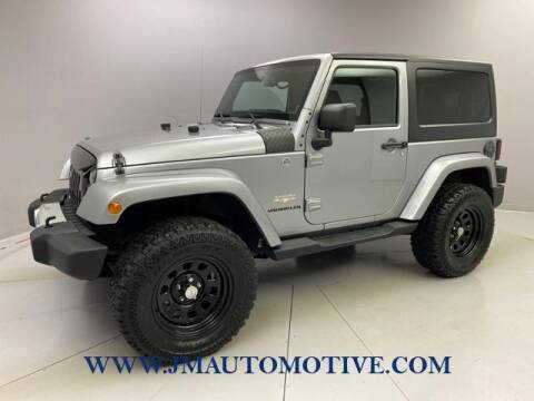2014 Jeep Wrangler for sale at J & M Automotive in Naugatuck CT