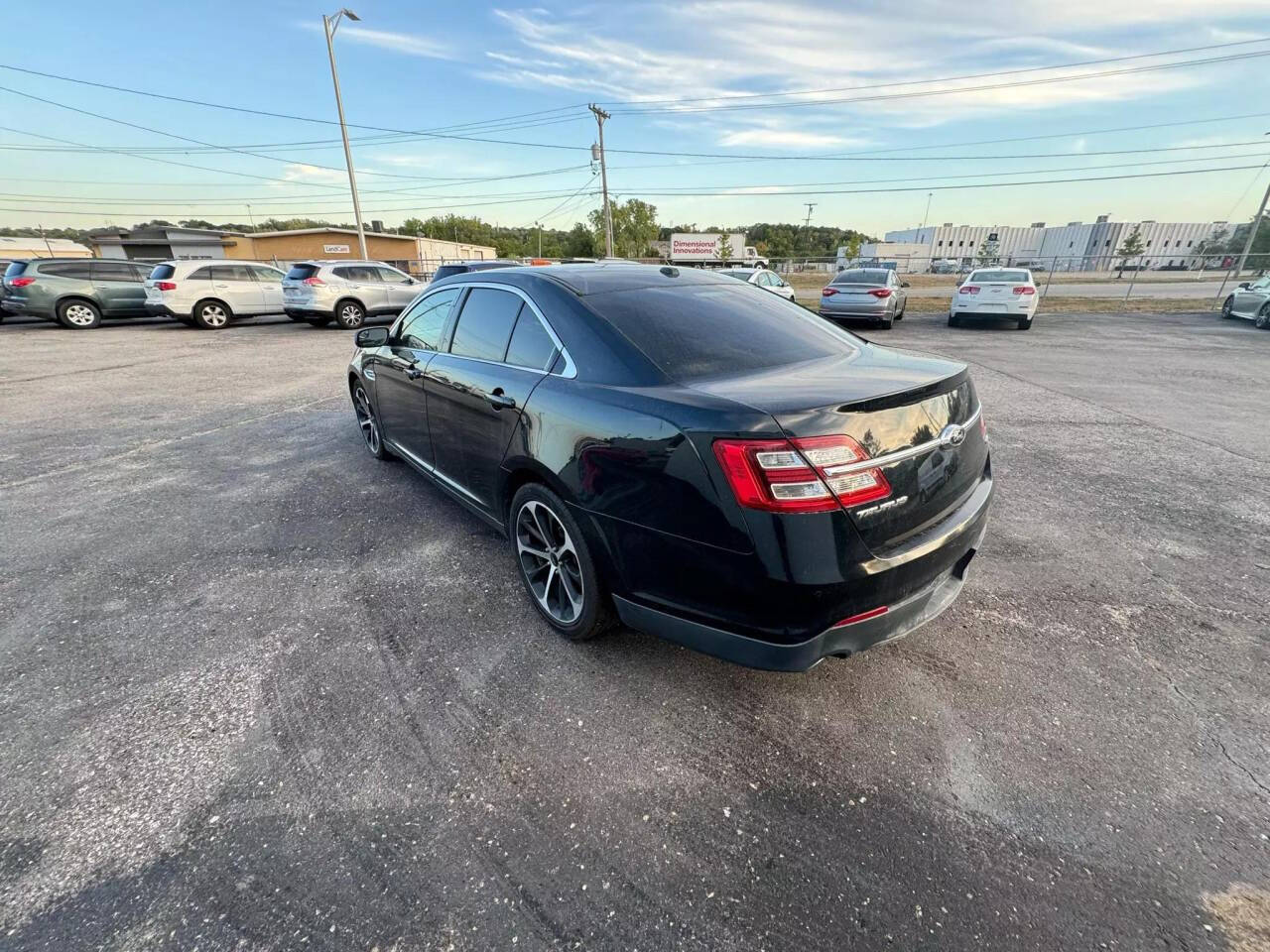 2014 Ford Taurus for sale at Autolink in Kansas City, KS