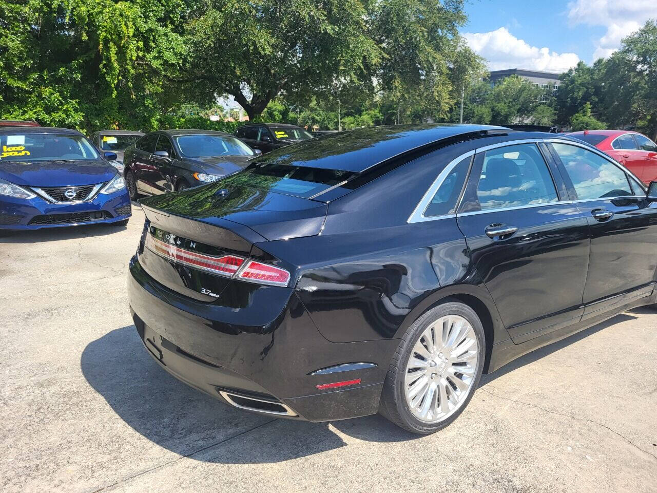 2016 Lincoln MKZ for sale at FAMILY AUTO BROKERS in Longwood, FL