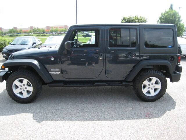 2018 Jeep Wrangler JK Unlimited for sale at FINNEY'S AUTO & TRUCK in Atlanta IN