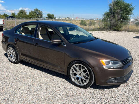 2013 Volkswagen Jetta for sale at BERKENKOTTER MOTORS in Brighton CO