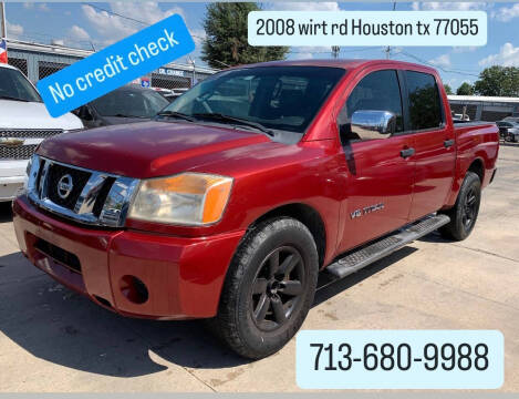 2014 Nissan Titan for sale at Hispanos Cars 4 Less by Cadena Motors, Inc. in Houston TX
