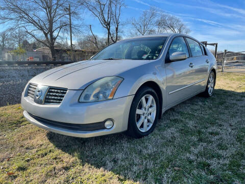 2004 Nissan Maxima for sale at Empire Auto Group in Cartersville GA