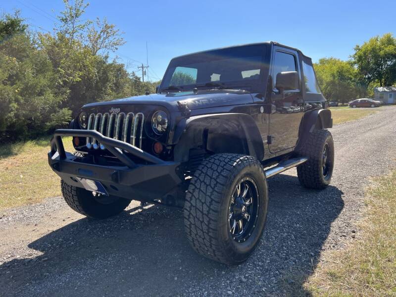 2011 Jeep Wrangler for sale at The Car Shed in Burleson TX