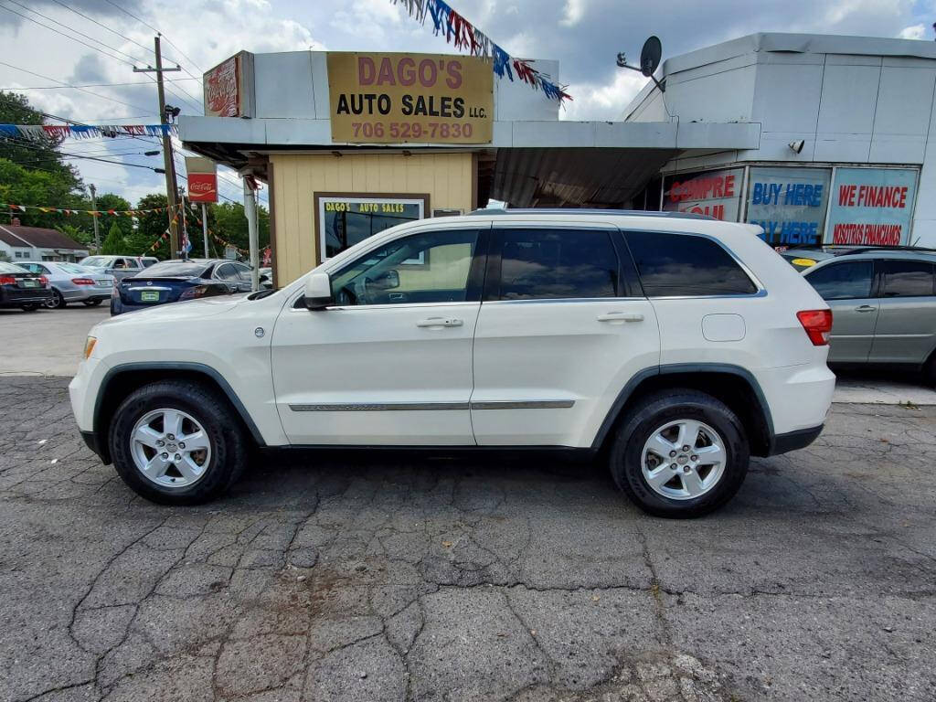 2011 Jeep Grand Cherokee for sale at DAGO'S AUTO SALES LLC in Dalton, GA