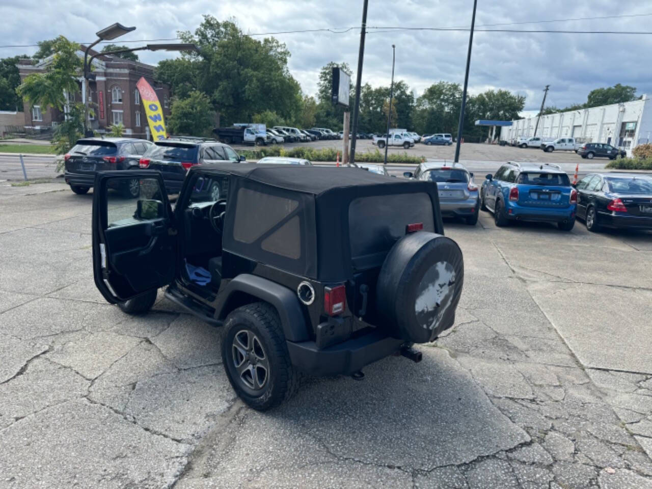 2011 Jeep Wrangler for sale at First Class Auto Mall in Akron, OH