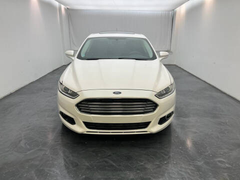 2014 Ford Fusion for sale at Roman's Auto Sales in Warren MI