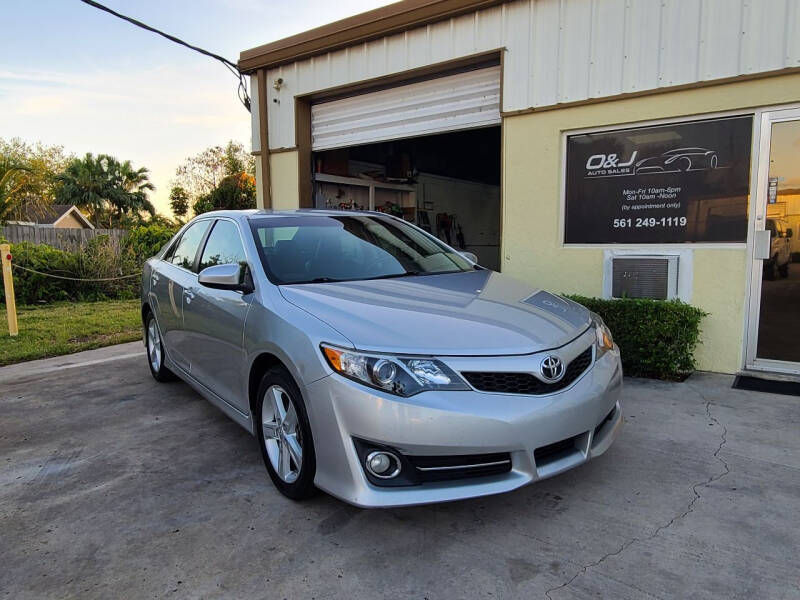 2012 Toyota Camry for sale at O & J Auto Sales in Royal Palm Beach FL