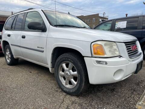 2006 GMC Envoy for sale at Jim's Hometown Auto Sales LLC in Byesville OH