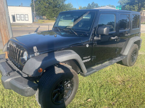 2011 Jeep Wrangler Unlimited for sale at LAURINBURG AUTO SALES in Laurinburg NC
