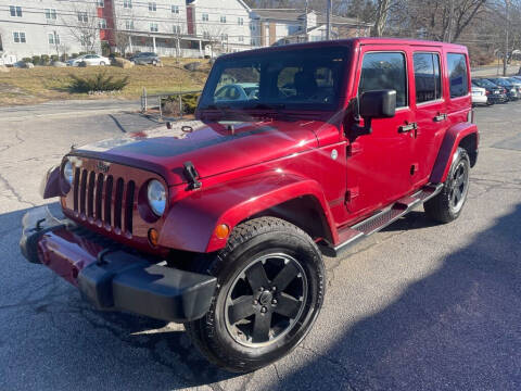 2012 Jeep Wrangler Unlimited for sale at Premier Automart in Milford MA