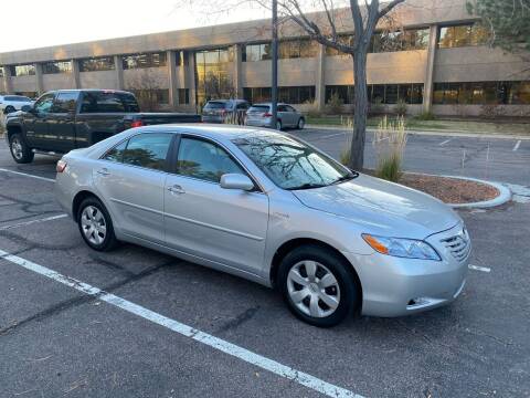 2009 Toyota Camry Hybrid for sale at QUEST MOTORS in Englewood CO