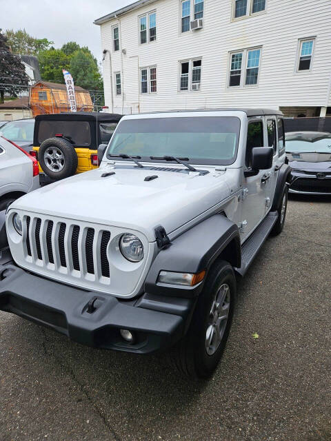 2019 Jeep Wrangler Unlimited for sale at RENOS AUTO SALES LLC in Waterbury, CT