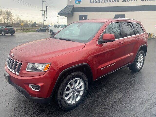 2014 Jeep Grand Cherokee for sale at Lighthouse Auto Sales in Holland MI