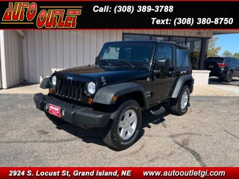 2011 Jeep Wrangler for sale at Auto Outlet in Grand Island NE