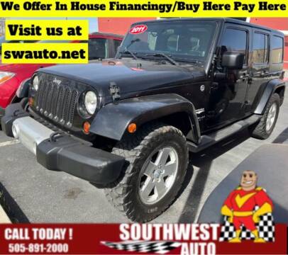 2011 Jeep Wrangler Unlimited for sale at SOUTHWEST AUTO in Albuquerque NM