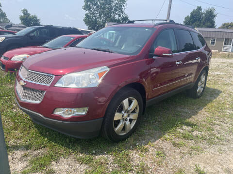 2011 Chevrolet Traverse for sale at HEDGES USED CARS in Carleton MI