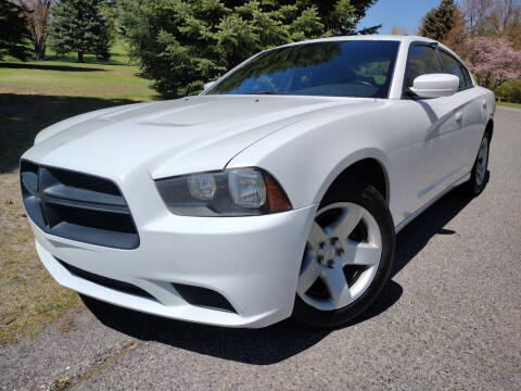 2011 Dodge Charger for sale at BELOW BOOK AUTO SALES in Idaho Falls ID