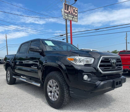 2019 Toyota Tacoma for sale at LLANOS AUTO SALES LLC in Dallas TX