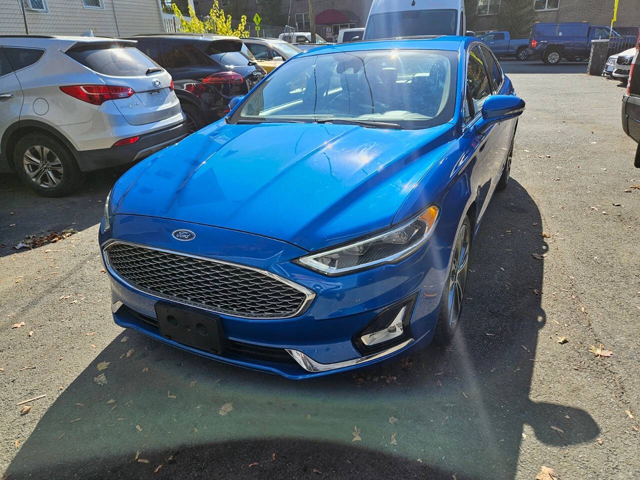 2020 Ford Fusion for sale at RENOS AUTO SALES LLC in Waterbury, CT