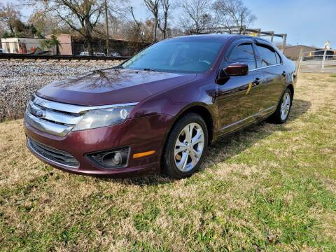 2012 Ford Fusion for sale at Empire Auto Group in Cartersville GA