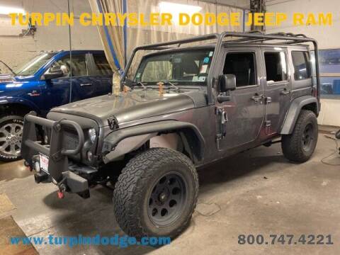 2014 Jeep Wrangler Unlimited for sale at Turpin Chrysler Dodge Jeep Ram in Dubuque IA