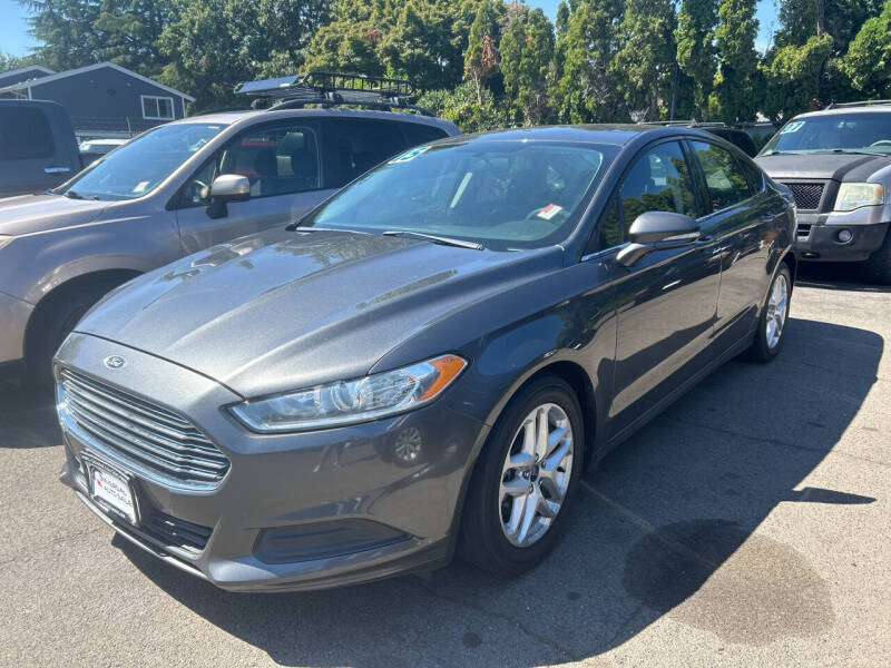 2015 Ford Fusion for sale at Universal Auto Sales Inc in Salem OR