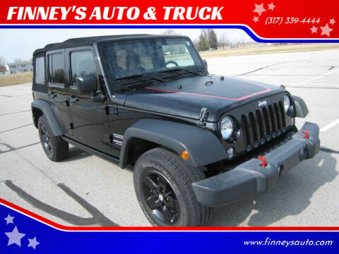 2016 Jeep Wrangler Unlimited for sale at FINNEY'S AUTO & TRUCK in Atlanta IN